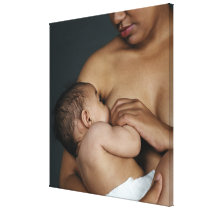Mother breastfeeding baby boy (6-11 months) canvas prints