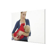 Mother breastfeeding her baby. gallery wrap canvas