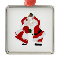Mr and Mrs Clause kissing ornament