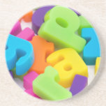 multi coloured alphabet letters background coaster