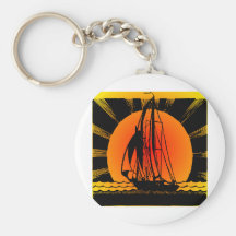 Navigation de voilier au coucher du soleil porte-clés