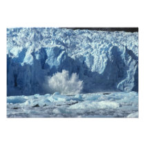 Newly-calved iceberg splashing into chilly