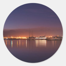 nightscape with sailboats round sticker
