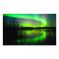 Northern lights mirrored on lake photo