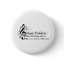 Not being able to take your piano with you. pinback button