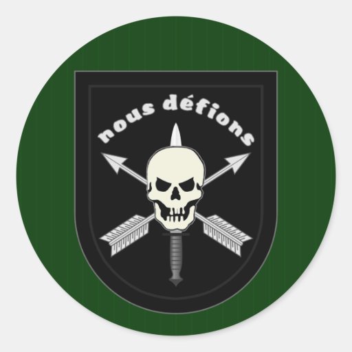 nous defions round sticker