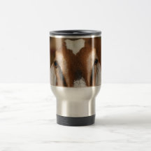 Nubian doe peeking over wooden rail coffee mug