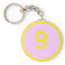 number 9 in a circle keychain