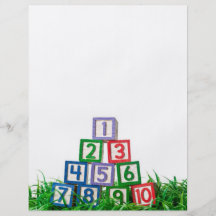 Number blocks stacked on grass flyers