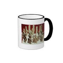 Offering of sixteen male figures, from La mugs