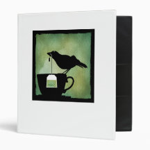 Oiseau sur un classeur de tasse de thé