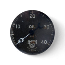Old pressure gauge from a vintage racing car buttons