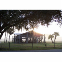 Old ranch building under trees with man statue acrylic cut out