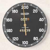 old speedometer gauge from a vintage race car drink coaster