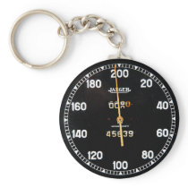 old speedometer gauge from a vintage race car key chains