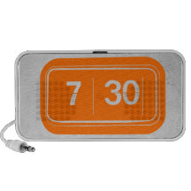 Orange alarm clock travel speaker