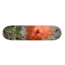 Orange Flower On Sand Skate Deck