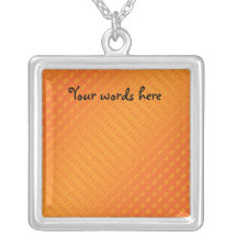 Orange polka dots on orange background pendants
