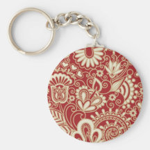 ornate flowers on red background key chain