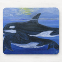 Orques nageant tapis de souris