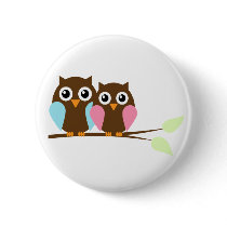 Owl couple on a branch