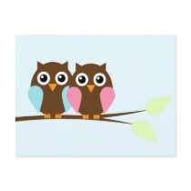 Owl couple on a branch