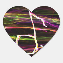 Pale coloured music note against black neon back heart stickers