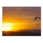 Paragliding on the sunset postcards