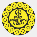 PEACE BEGINS WITH A SMILE ROUND STICKER