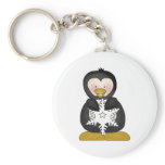 penguin holding snowflake keychains