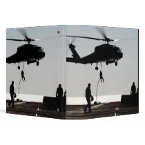 Personnel fast-rope out of an SH-60F 3 Ring Binder