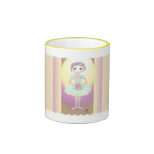 Petite ballerine dans la tasse verte de tutu
