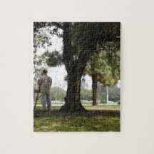 Photo of a man painting in the park puzzles