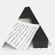 Piano keys with music stickers