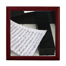 Piano keys with music trinket boxes