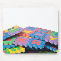 Pile des blocs d'alphabet tapis de souris