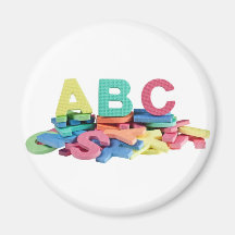 Pile of alphabet blocks refrigerator magnets