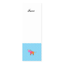 Pink and orange unicorn on blue polka dots