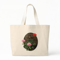 Pink and Red Geraniums Against Brick Bag