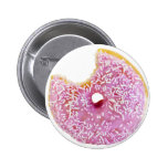 pink doughnut with a missing bite badge