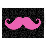 Pink handlebar moustache on black damask pattern cards