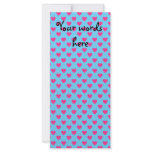 Pink hearts on blue background