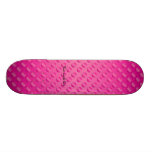 Pink polka dots on pink background skateboard