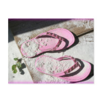Pink sandy flip flop sandals on Florida beach