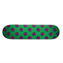 Pink shamrocks on green background skateboard