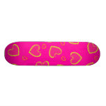 Pink with green neon hearts skateboard