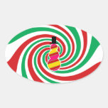 Pink yellow snowman on red green swirl sticker