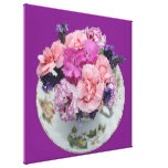 Pinks carnations in teacup stretched canvas prints