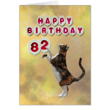 Playful cat and 82nd Happy Birthday balloons Card