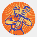 Plumber wielding holding monkey wrench retro round sticker
